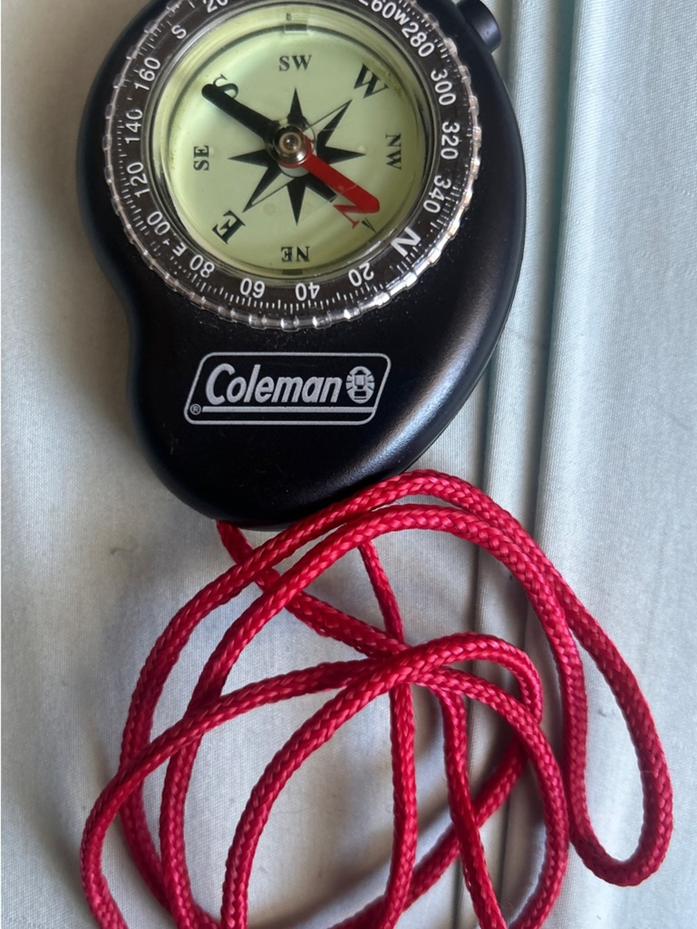 Coleman Black Compass with Red Cord
